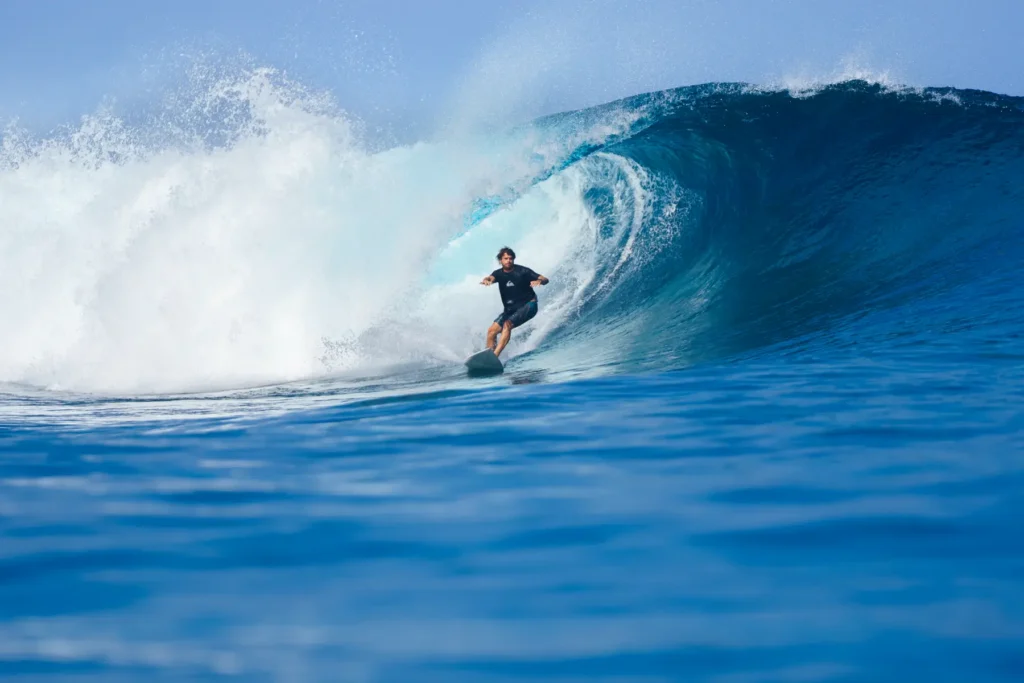 Surfer inside a barrel on a Mentawai wave