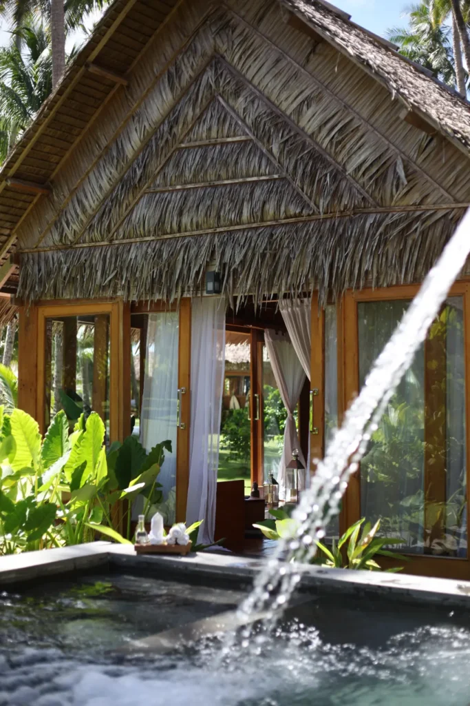 Thermal pool with a water spout at the Awera spa