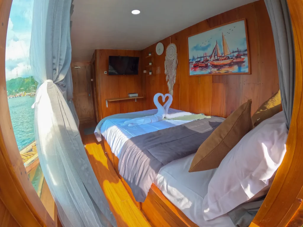 Master cabin on Dinara with double bed and Android TV