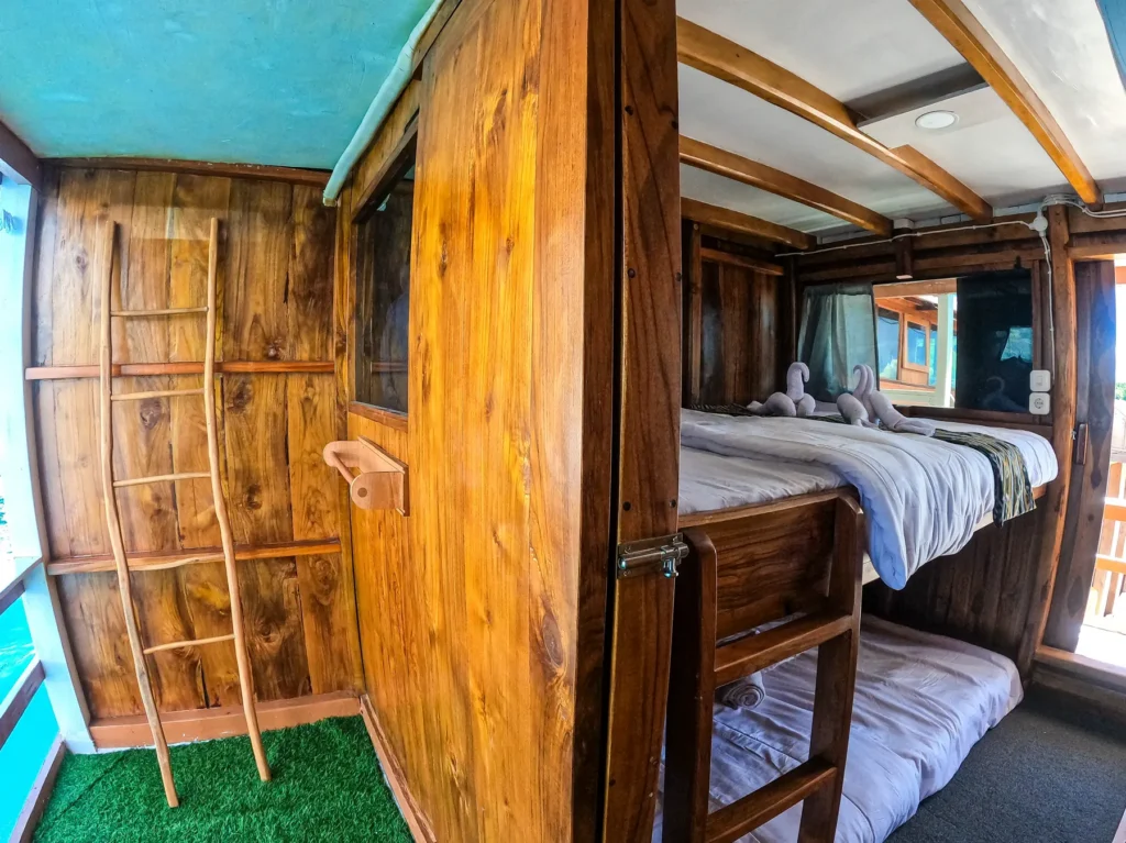 Ladder and beds in the Merapi family cabin on Dinara