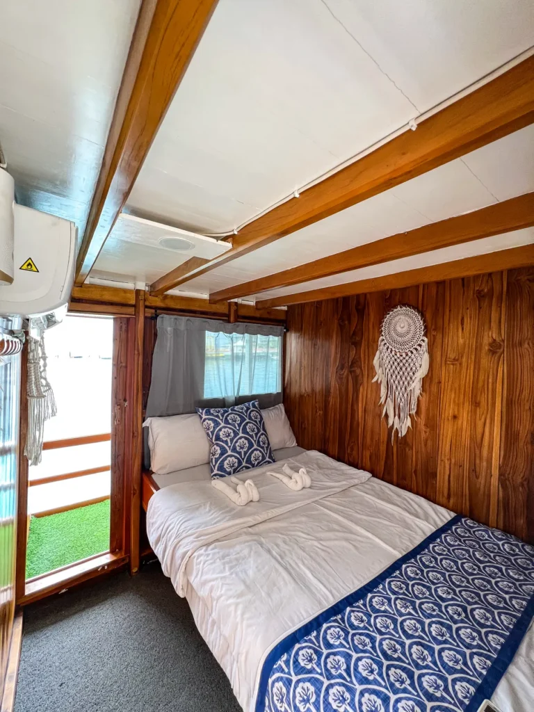 Double bed in the Tambora cabin on Dinara