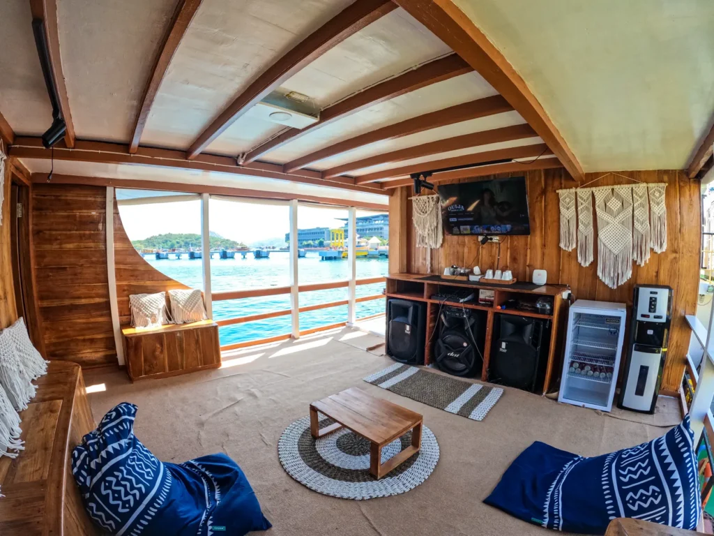 Lounge on Dinara with bean bags, a television and karaoke