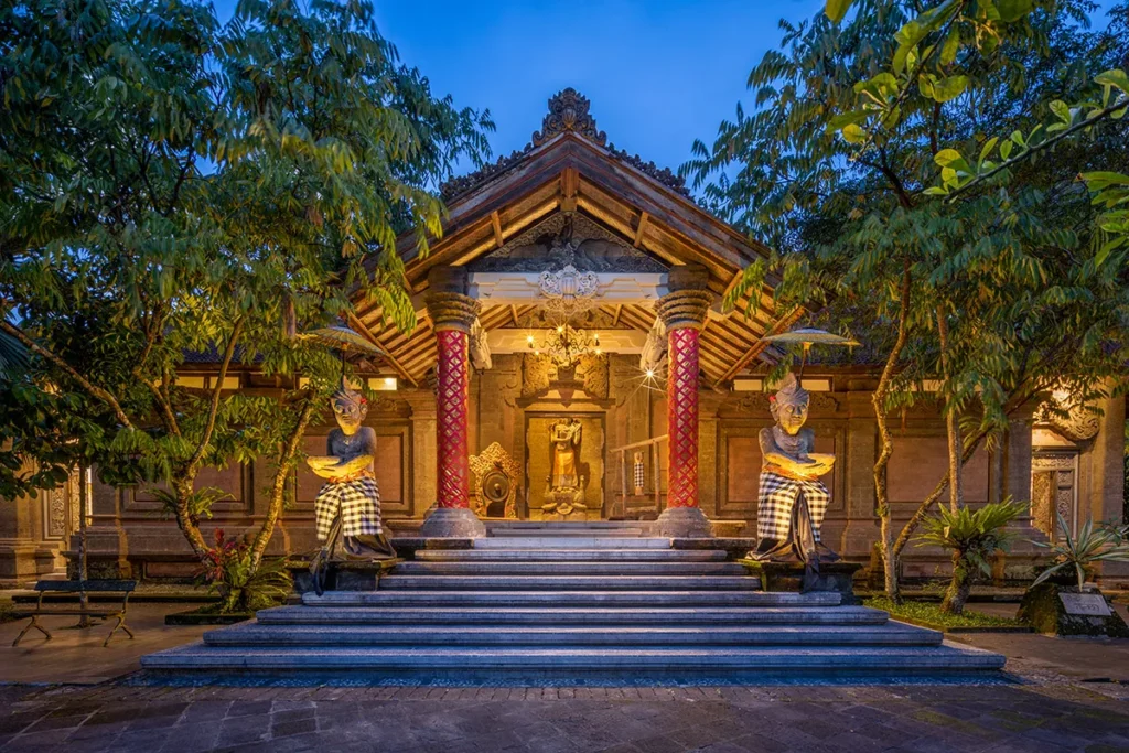Bale Dauh pavilion at ARMA Museum lit up at dusk
