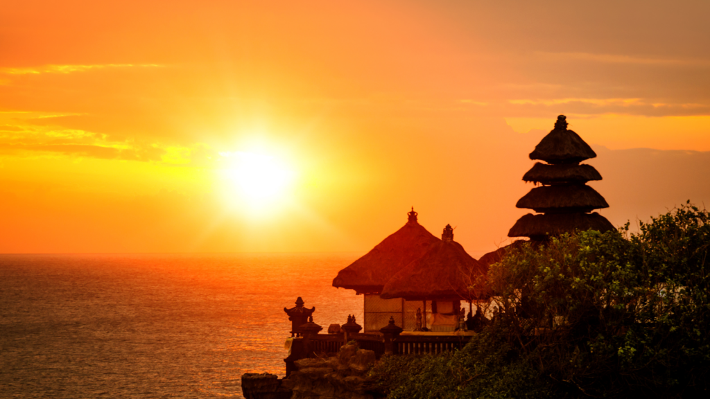 Sunset behind the sea temple at Tanah Lot on Bali's west coast