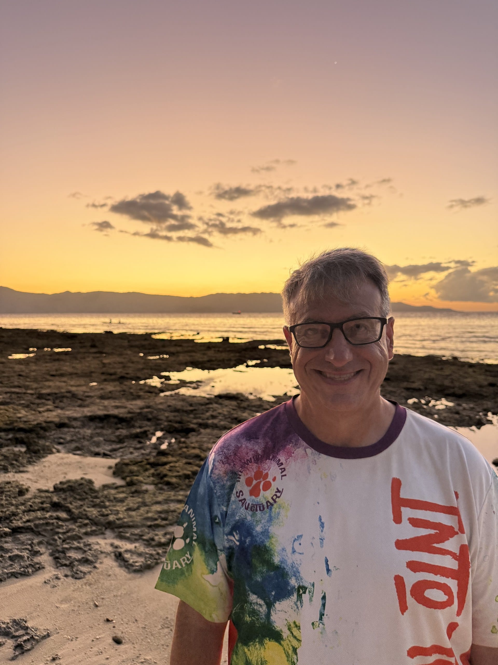 Dean on the beach in Alor at sunset