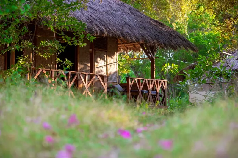 A Standard bungalow at La P'tite Kepa among the trees and grass