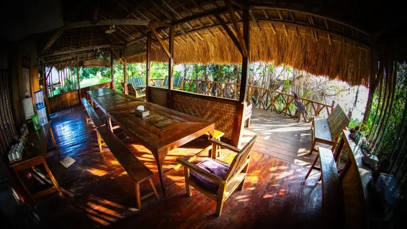 The open-sided dining and lounge area, built from bamboo and timber