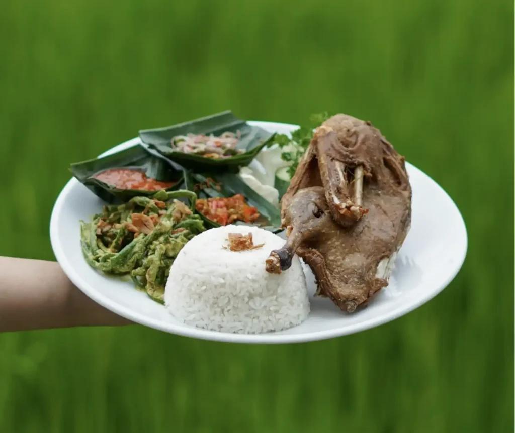Crispy duck with rice, sambal and vegetables at Bebek Tepi Sawah