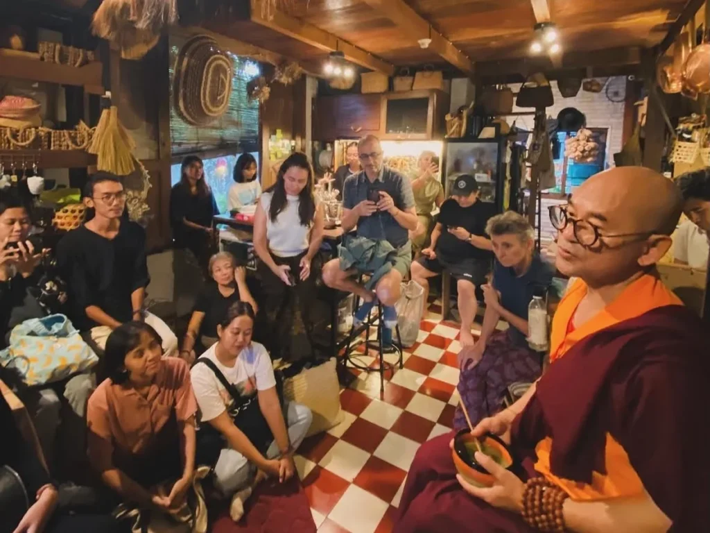 Guests seated together at a community gathering in a Yogyakarta home