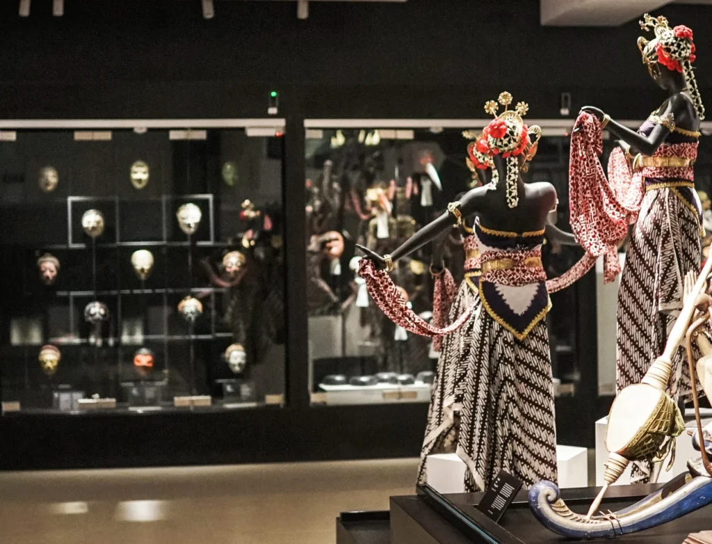 Puppets and masks in the display cases of Museum Sonobudoyo