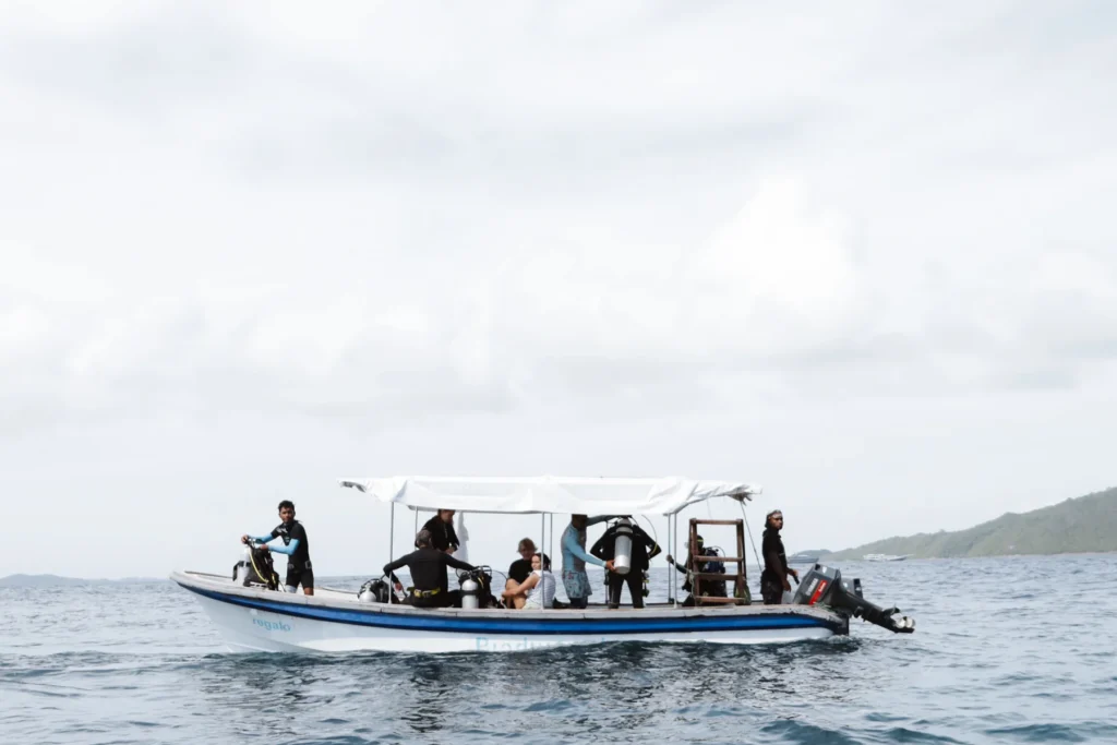 Resort dive boat with divers on the Dampier Strait