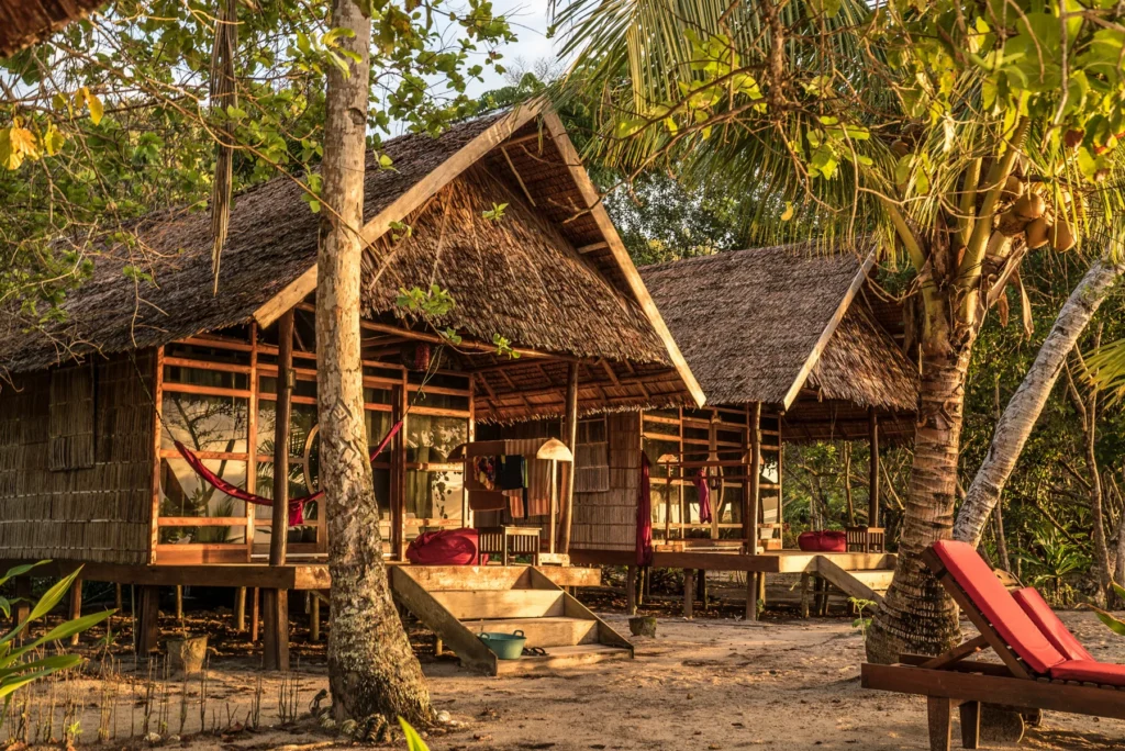 Two Superior Cottages near the restaurant, which connect through their bathrooms